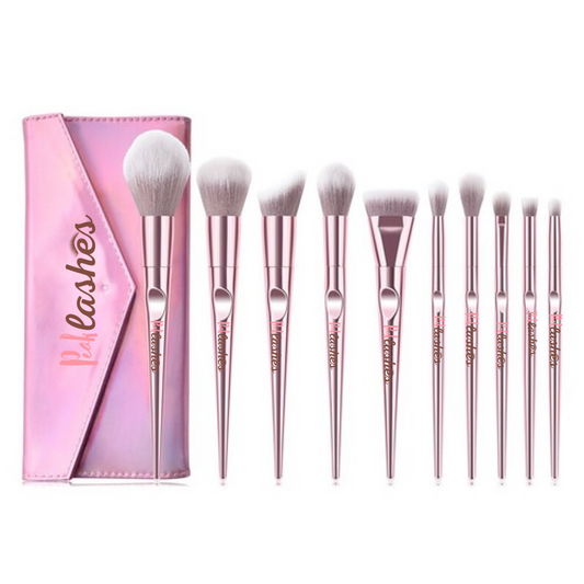 Set of makeup brushes with a pink case on a white background