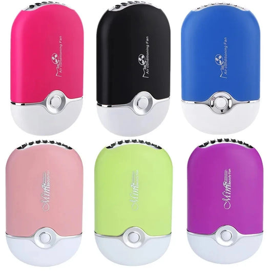 Set of six colorful handheld hair dryers on a white background